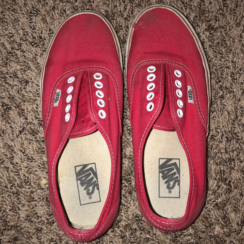 Vans. Small rip on right shoe on toe. No laces